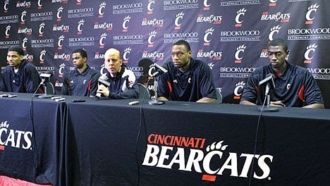 &lt;p&gt;Cincinnati head coach Mick Cronin, third from left, speaks at a news conference, Monday in Cincinnati, where he and players, left to right, Octavius Ellis, Ge'Lawn Guyn, Yancy Gates, and Cheikh Mbodj, apologized for the fight that broke out at the end of an NCAA college basketball game between Cincinnati and Xavier, Saturday.&lt;/p&gt;