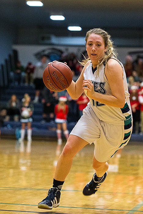 <p>Lake Citys Clarissa Smith drives to the basket in the second half against Sandpoint.</p>