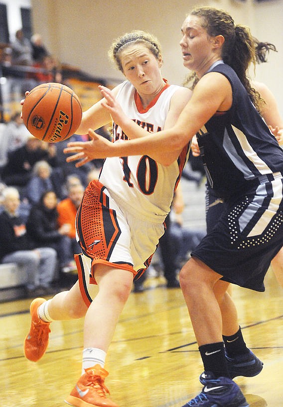 &lt;p&gt;Flathead Bravette guard Kylee Meredith drives past Great Falls High&#146;s Hannah May during the third quarter of Saturday&#146;s Class AA nonconference girls basketball game at Flathead High School. (Aaric Bryan/Daily Inter Lake)&lt;/p&gt;