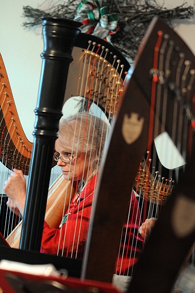 <p>Harp Instructor Diane Dikerson leads the eight harp ensemble in
rehearsal on Sunday afternoon at the North Valley Music School in
Whitefish. The harps will perform their Christmas Harp Solo and
Ensemble Recital on Friday beginning at 5:45 p.m. at the First
Presbyterian Church. The recital is being given in conjunciton with
the annual Whitefish Christmas Stroll.</p>