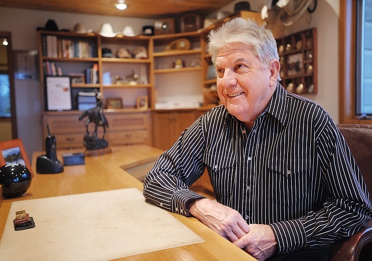 Larry Wilson, Chairman/CEO of Alpha Broadcasting in his home office at his ranch in Ferndale on Friday.