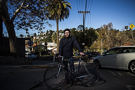 &lt;p&gt;Hit-and-run victim Topher Osborn is photographed Nov. 5 at the intersection of Easterly Terrace and Silver Lake Boulevard, across the street from where he was hit while riding his bike.&#160;&lt;/p&gt;