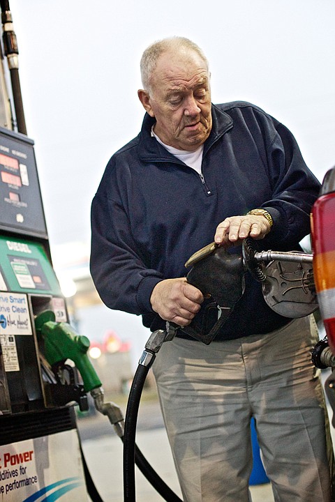 &lt;p&gt;JEROME A. POLLOS/Press Floyd Moyer fills the tank of his car Tuesday at the Holiday Station in Hayden where regular unleaded was advertised at $3.33 a gallon.&#160;&lt;/p&gt;