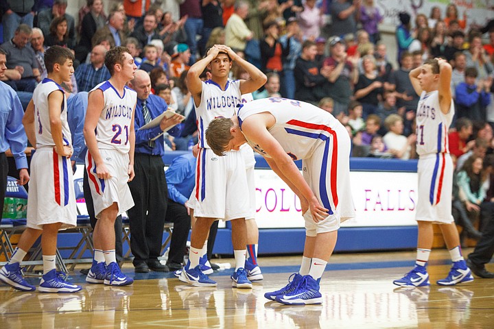 &lt;p&gt;Patrick Cote/Daily Inter Lake Columbia Falls players react to their home loss Friday to Flathead. Friday, Dec. 14, 2012 in Columbia Falls, Montana.&lt;/p&gt;