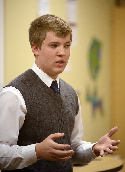 <p>Brenda Ahearn/Daily Inter Lake Blake Ladenburg of Columbia Falls presents an Extemporaneous piece at the 2012 Valley Talkdown on Thursday, December 13, in Kalispell.</p>