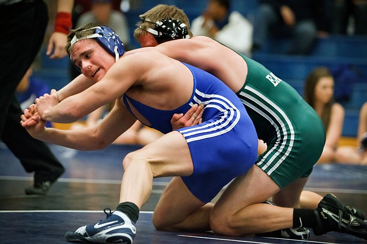 &lt;p&gt;Coeur d'Alene High's Kenny Staub fights to move his opponent from Lakeside High into position during the 140-pound match Wednesday.&lt;/p&gt;