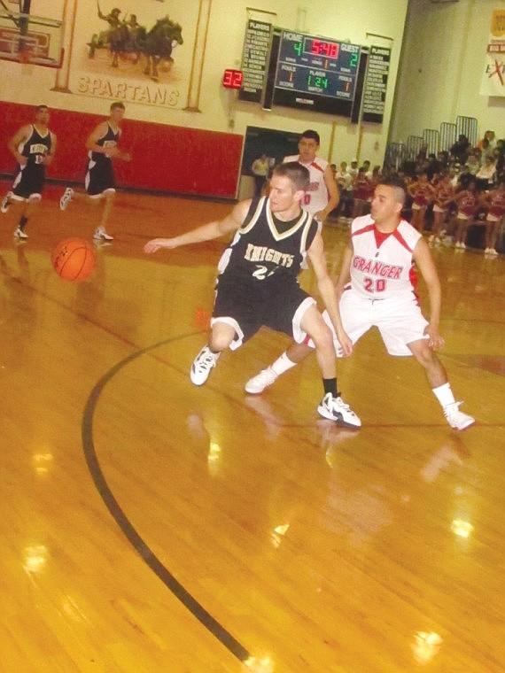 Royal guard Danny Vermeer, 24, nearly loses control of the ball
at the front of a fastbreak against Granger defensive pressure.