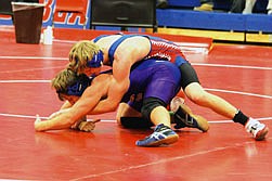 Superior wrestler Dan Taron gets on top of his man duirng their match on Friday night.