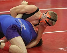 119 pound Kenneth Beech wrestles Casey Nitschke of Mission-Charlo at the Superior Invitational.