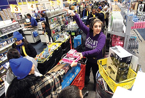 &lt;p&gt;FILE - In this Friday, Nov. 25, 2011 file photo, customers shop at a Best Buy store in Burbank, Calif. The official kickoff to the holiday shopping season underscored a big challenge to retailers: shoppers will only come out when they believe they're getting a big discount. Stores' own version of the Super Bowl got off to a robust start, helped by early store openings and heavy price cutting. But many analysts worry that the heavy marketing hype that pulled in the crowds will steal some thunder from the rest of the season. (AP Photo/Jae C. Hong, File)&lt;/p&gt;
