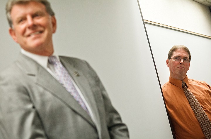 &lt;p&gt;SHAWN GUST/Press St. Maries High School principal John Cordell looks on as Gov. Otter offers his approval of the state's education network technology program.&lt;/p&gt;