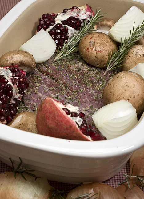 &lt;p&gt;This Nov. 21, 2010 photo shows pomegranate-rosemary brisket with red wine jus in Concord, N.H. If you can spare about 15 minutes a few hours before dinner, you can get this meal on the table with almost no effort.&lt;/p&gt;