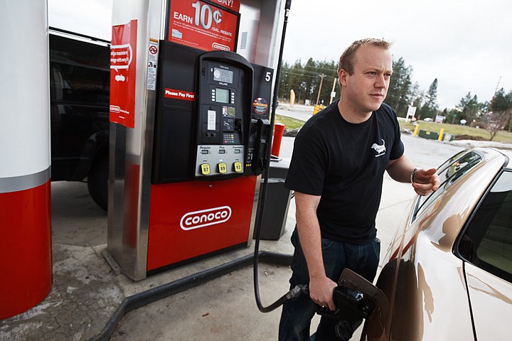 &lt;p&gt;Krister Nordby fuels up his vehicle Wednesday at Fairway Grocery and Gas in Coeur d'Alene. Gas prices in the area have reached the $3 mark for the first time since 2008.&lt;/p&gt;