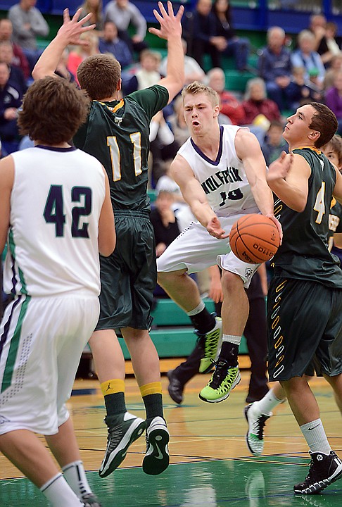 &lt;p&gt;Glacier senior Evan Epperly (10) makes a mid-air pass to junior Truman Pisk (42) during the game against CMR on Friday, December 13, in Kalispell. (Brenda Ahearn/Daily Inter Lake)&lt;/p&gt;