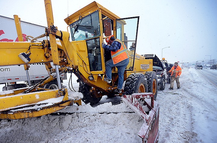 &lt;p&gt;A snow grader gets a jump start at the intersection of Main and Center streets in downtown Kalispell on Tuesday. Road crews were kept busy plowing heavy snow across Northwest Montana. (Brenda Ahearn/Daily Inter Lake)&lt;/p&gt;