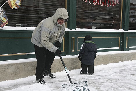 &lt;p&gt;Jose Contreras, owner of La Sierra restaurant in Spirit Lake, shovels snow during last month's winter storm. The city of Spirit Lake allocates a large percentage of taxpayer dollars for street plowing - much needed in Spirit Lake, where winters are often fierce.&lt;/p&gt;