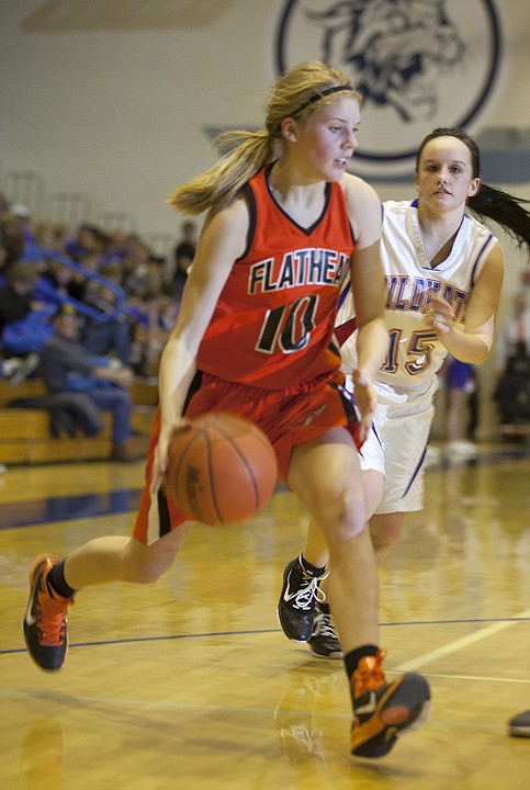 &lt;p&gt;Flathead forward Emma Andrews (10) drives past Columbia Falls
guard Kathryn Jetty (15) during Flathead&#146;s victory over the
Wildkats at Columbia Falls Friday night.&lt;/p&gt;