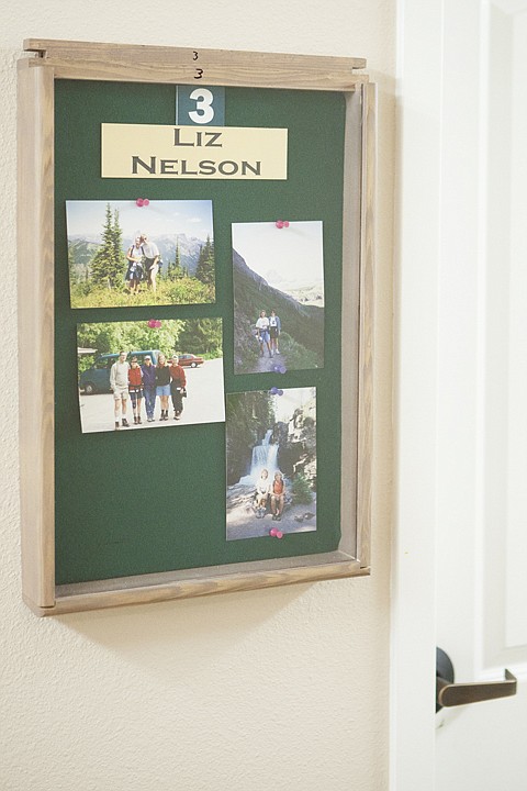 <p>Memory boxes, filled with the resident's name as well as
pictures of family and friends, are placed outside of each
resident's room.</p>