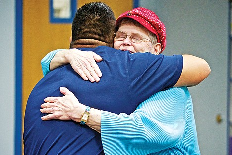 &lt;p&gt;Eva Sherrill gives an appreciative hug to Coeur d'Alene Tribal Chairman Chief Allan following a presentation Friday where the Coeur d'Alene Tribe donated $35,000 to the Post Falls Food Bank&Otilde;s new Weekend Nutrition Backpack program. There are currently approximately 75 elementary students participating in the program. Sherrill is one of the 14 volunteers who fills backpacks with foods for children in need.&lt;/p&gt;