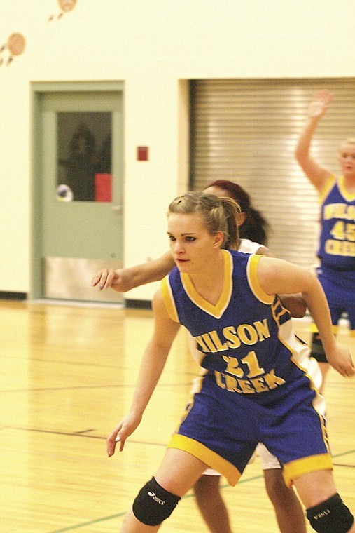 Holly Wilson (21) scored 17 points Wednesday night for Wilson Creek as the Lady Devils won their second straight league road game.