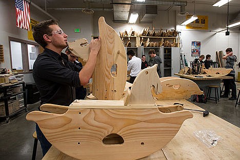 &lt;p&gt;Nathaniel Frame, 17, works on a rocking horse during Bill Lawson&#146;s Construction I class at Post Falls High School on Wednesday afternoon. Over 20 students from the class donated their rocking horses to Christmas for All.&lt;/p&gt;