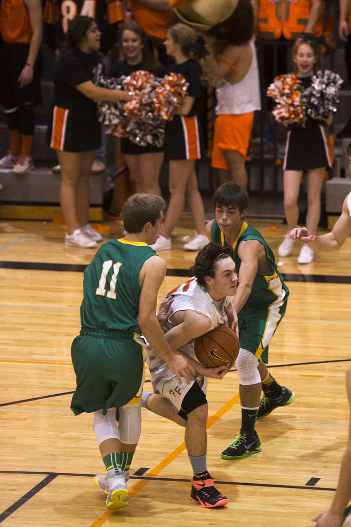 &lt;p&gt;The Lakeland Hawks and Post Falls Trojans competed in their annual basketball rivalry and spirit competition known as Prairie Pig in Post Falls on Friday, Dec. 19, 2014.&lt;/p&gt;