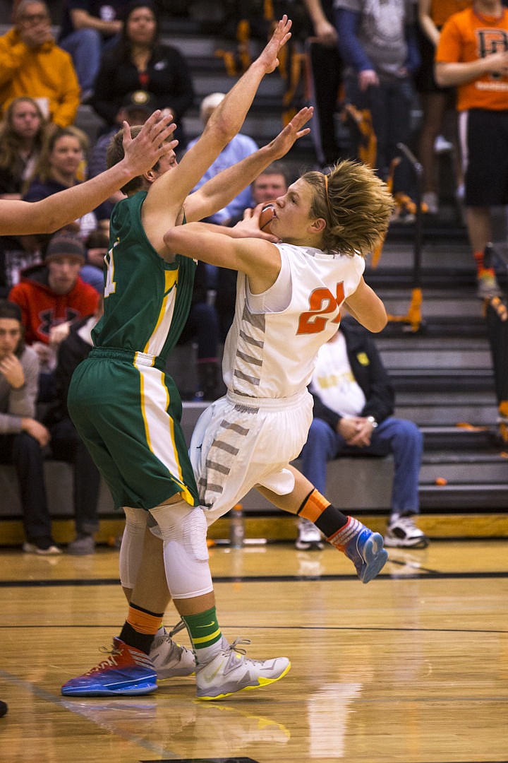 &lt;p&gt;The Lakeland Hawks and Post Falls Trojans competed in their annual basketball rivalry and spirit competition known as Prairie Pig in Post Falls on Friday, Dec. 19, 2014.&lt;/p&gt;