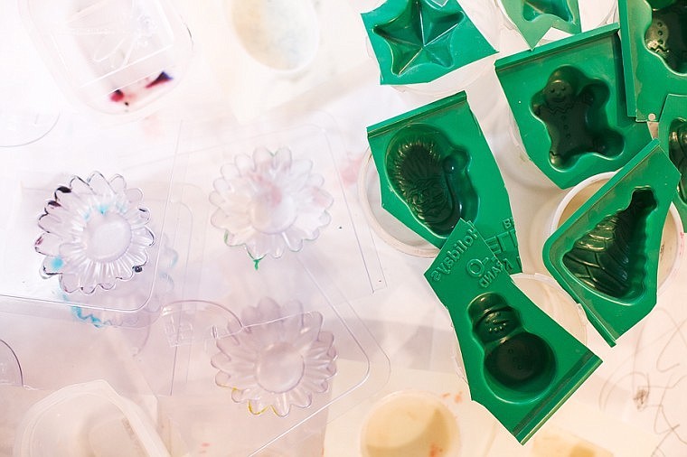 <p>Soap molds are ready to be filled at the workshop.</p>