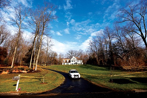 &lt;p&gt;A police cruiser sits in the driveway as crime scene tape surrounds the home of Nancy Lanza, Tuesday in Newtown, Conn. Nancy Lanza was killed by her son Adam Lanza before he forced his way into Sandy Hook Elementary School in Newtown Friday and opened fire, killing 26 others, including 20 children, before shooting himself.&lt;/p&gt;