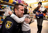 Coeur d'Alene officers show a different side while distributing gifts