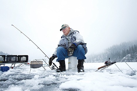 &lt;p&gt;Rusty Christensen took Friday morning to pull a sled carrying fishing rods and tackle boxes onto frozen Fernan Lake for his first ice-fishing trip of the season. &Ograve;Come on fishies,&Oacute; he said, bobbing his pole. Christensen claimed his spot in the center of the lake with two poles, one rigged with a worm for trout and the other with maggots for perch. &Ograve;I was trying to go all the way across (the lake)&Eacute; but I got tired so I stopped here,&Oacute; Christensen said. Rusty moved to Coeur d&Otilde;Alene from his home in North Dakota in the mid-1980s. &Ograve;I knew I would be retiring soon and I wanted to go somewhere that had a lot of things to do for free.&Oacute;&lt;/p&gt;