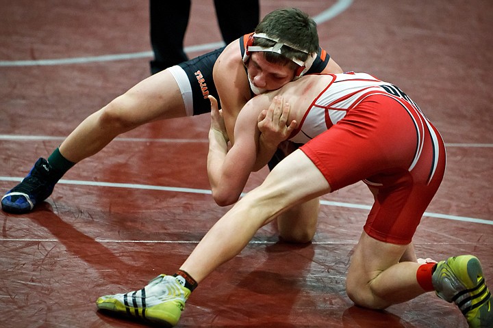 &lt;p&gt;Post Falls High's James Ost, maintains control of Shannon Maris from Orting High by decision in the third-place 135-pound match Saturday at Tri-State.&lt;/p&gt;