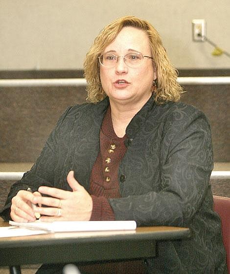 Photo by Aaric Bryan&lt;br&gt;Vicki Knudsen, a labor mediator for the Montana Department of Labor and Industry, speaks to the St. Regis Board of Trustees at the school Wednesday.