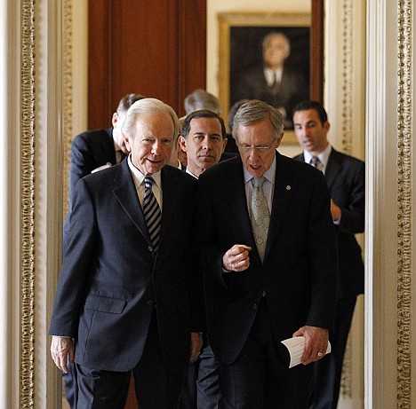 &lt;p&gt;Sen. Joe Lieberman, I-Conn., left, and Senate Majority Leader Sen. Harry Reid, D-Nev., right, with Joe Solmonese, president of the Human Rights Campaign, center, head to a news conference about the &quot;Don't Ask Don't Tell&quot; bill on an unusual Saturday session on Capitol Hill in Washington.&lt;/p&gt;