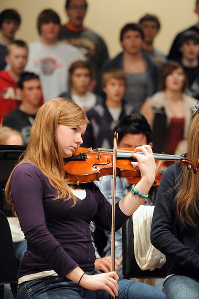 &lt;p&gt;Glacier senior Breana Larson plays violin during the rehearsal
of the Choir and Orchestra Combined Holiday Concert Wednesday
morning. The concert is free to the public and will be performed
two times today at 4 and 7 p.m.&lt;/p&gt;