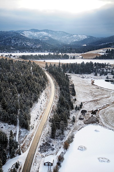 &lt;p&gt;Foys Lake Road glints in the afternoon sunlight on Monday
afternoon, December 12, just west of Kalispell.&lt;/p&gt;