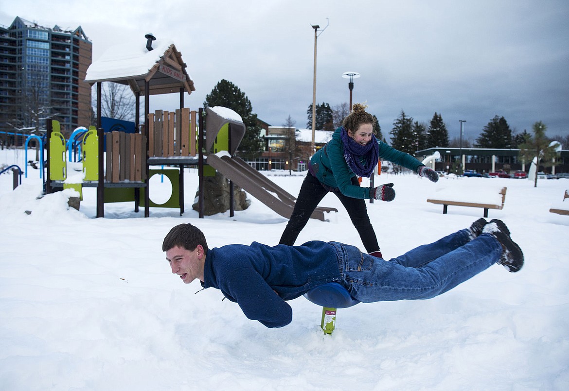 &lt;p&gt;Esther Wiegardt spins Seth Kazenberger around on a playground toy Monday afternoon at McEuen Park.&lt;/p&gt;