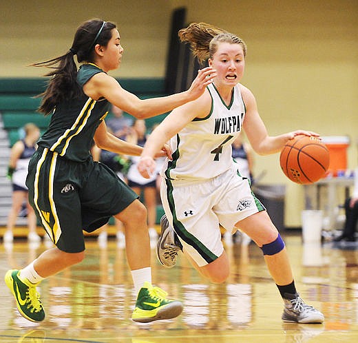 &lt;p&gt;Glacier Wolfpack guard Hailee Bennett drives past Whitefish defender Dani Douglas during the second quarter of Saturday&#146;s nonconference basketball game at Glacier High School. (Aaric Bryan/Daily Inter Lake)&lt;/p&gt;