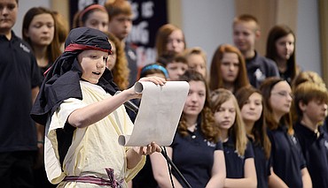 <p>Tre Krause, playing the part of Joseph, reads a letter explaining his thoughts and feelings as a witness to the events surround the birth of Jesus as part of the "Christmas Letters" program at Trinity Lutheran on Thursday, December 20, in Kalispell.</p>