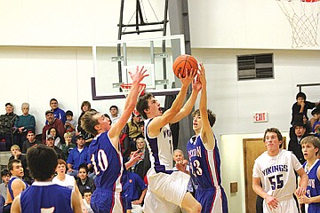 &lt;p class=&quot;p1&quot;&gt;Webb O&#146;Neill knifes his may through a pair of Mission defenders for a layup on Friday. He scored six points in the contest.&lt;/p&gt;