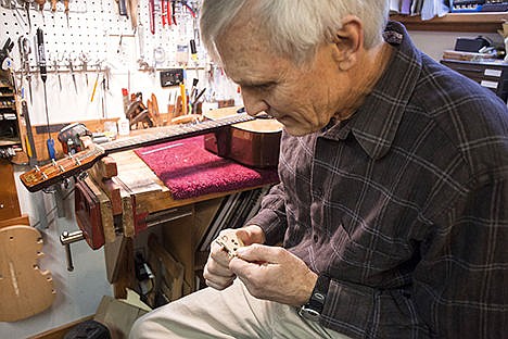 &lt;p&gt;Paul Hill carves adjustments into a violin bridge in his basement workshop on Friday in Moscow.&#160;&lt;/p&gt;