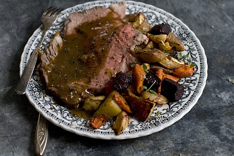 &lt;p&gt;This Nov. 14, 2011 photo shows beef rib roast with shallot-merlot gravy and vegetables in Concord, N.H. This recipe uses a bone-in rib-eye, a beautifully marbled, flavorful cut of beef. (AP Photo/Matthew Mead)&lt;/p&gt;