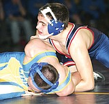 Cats win Eureka tourney, fall to Libby in dual
