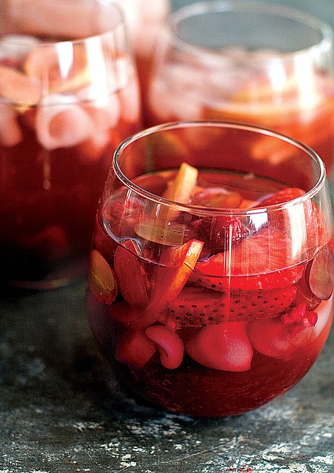 <p>This Nov. 21, 2011 photo shows Rocco DiSpirito's recipe for New Year's resolution sangria in Concord, N.H. This recipe is alcohol-free and low in calories. (AP Photo/Matthew Mead)</p>