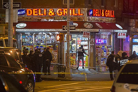 &lt;p&gt;Investigators work in the area where two NYPD officers were shot in the Bedford-Stuyvesant neighborhood of the Brooklyn borough of New York on Saturday.&#160;&lt;/p&gt;