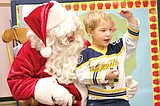 Preschool students meet Santa