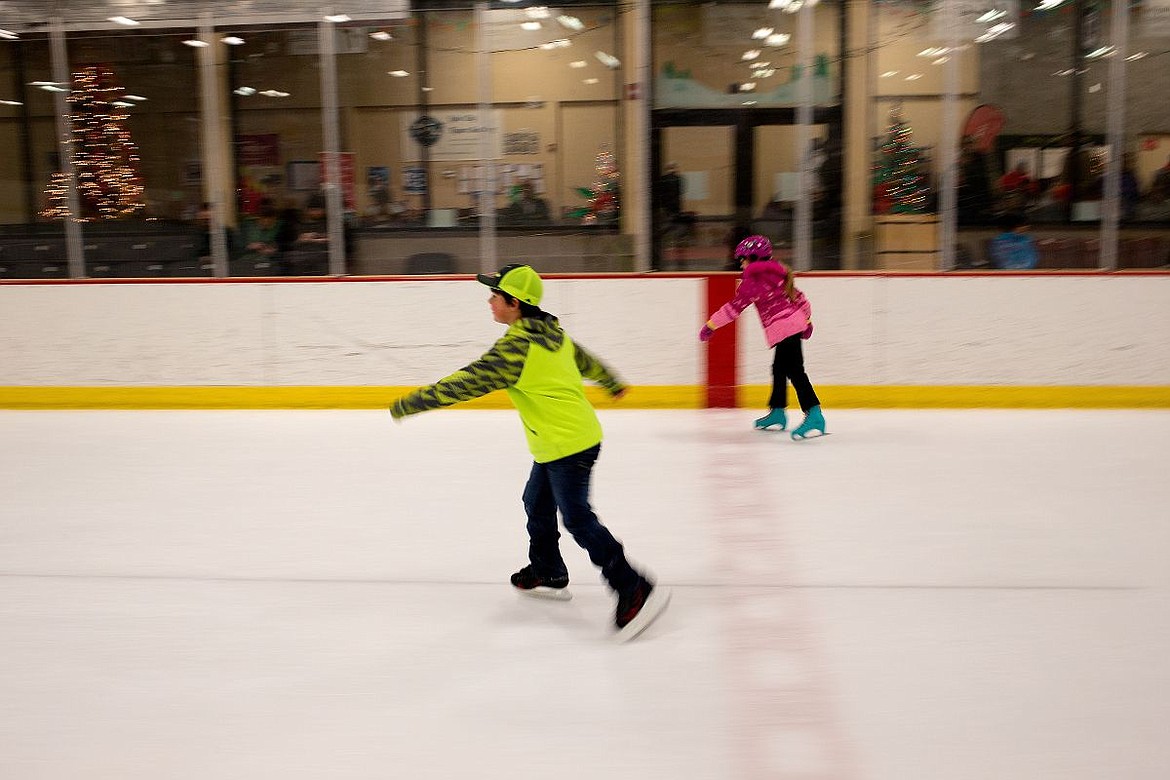 &lt;p&gt;&#160;At left, Kolbe Coey, 8, and Natalie Kozeleuh, 9, whiz around the ice rink during public skate on Saturday at Frontier Ice Arena in Coeur d'Alene.&lt;/p&gt;
