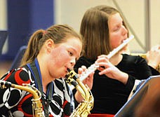 Jessie Steidley and Rebecca Maier play in the band during the elementary Christmas program.