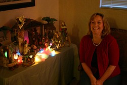 Daphne Boles shows off her favorite Nativity scene during the Tour of Homes last Saturday.