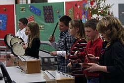 Fifth-graders Tibb Carr, Anjel Martin, Morgan Beech, Jay Von Heeder, Rebecca Johnson, Tanner Ovitt, and Jacelynn DuBois take part in the Elementary Christmas Concert last Thursday evening.